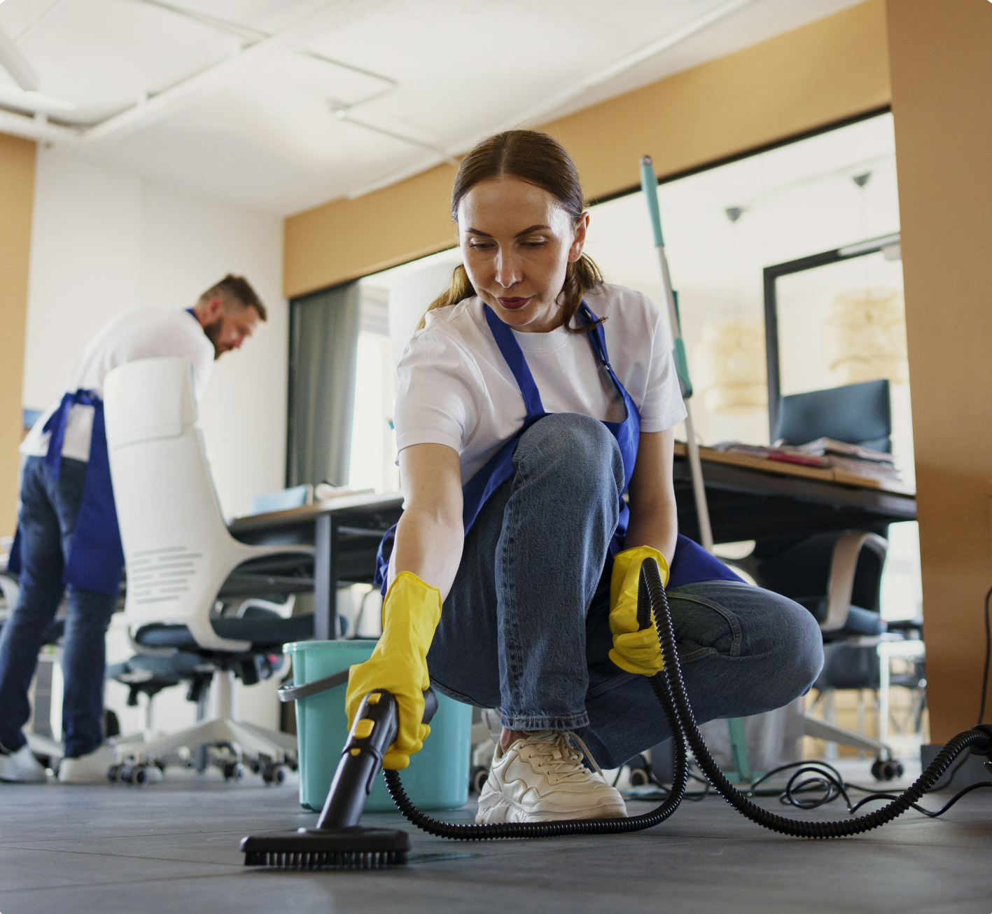 professional-cleaning-service-person-using-vacuum-cleaner-office (1)